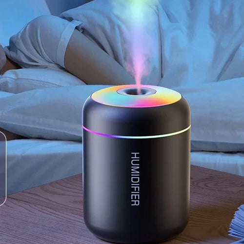 Humidificateur posé sur une table de chevet